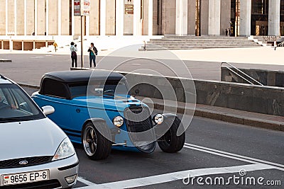 Blue Factory Fiveâ€™s â€™33 Hot Rod on the street in the city Editorial Stock Photo